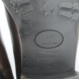 Chanel Chelsea boots in dark brown leather with cap-toe, pre-owned authentic luxury with light scuffs