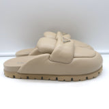 Prada triangle-logo padded flat mules in nude leather, pre-owned, excellent condition