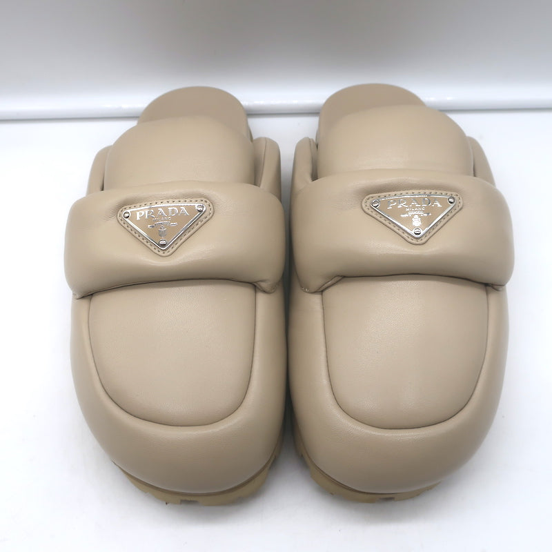 Prada triangle-logo padded flat mules in nude leather, size 38.5 - authentic pre-owned luxury