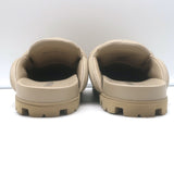 Prada triangle-logo padded flat mules in nude leather, size 38.5 — new without tags, authentic luxury