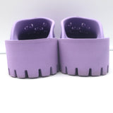 Gucci Elea perforated GG platform mules in lavender rubber, size 38, pre-owned, authentic luxury condition.