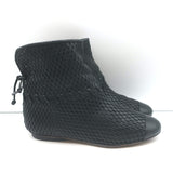 Chanel cap-toe flat ankle boots in black perforated leather, pre-owned authentic luxury, gently worn, size 38