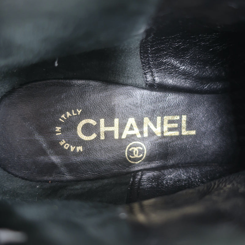 Authentic pre-owned Chanel cap-toe perforated black leather flat ankle boots, size 38