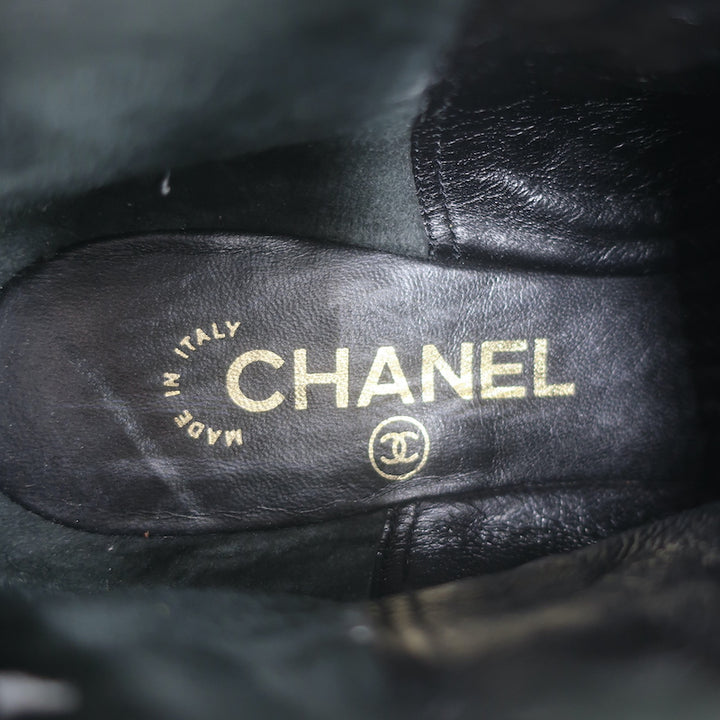 Authentic pre-owned Chanel cap-toe perforated black leather flat ankle boots, size 38