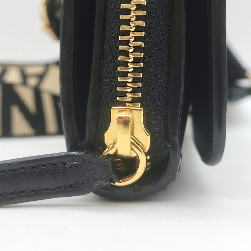 Stella McCartney Perforated Logo Mini Crossbody Bag Black Faux Leather Wallet
