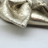 Valentino Unchateau bow mules in gold metallic cracked leather, pre-owned authentic luxury flat (EU 38.5)