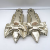 Valentino Unchateau bow mules in gold metallic cracked leather, authentic pre-owned luxury flats