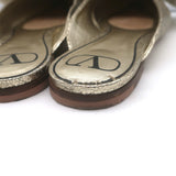 Valentino Unchateau bow mules in gold metallic cracked leather, authentic pre-owned luxury flat