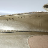 Valentino Unchateau bow mules in gold metallic cracked leather, pre-owned, authentic luxury flat with signature bow