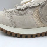 Authentic Christian Dior C'est Dior ecru fringed suede and mesh sneakers, size 38.5, pre-owned in good condition