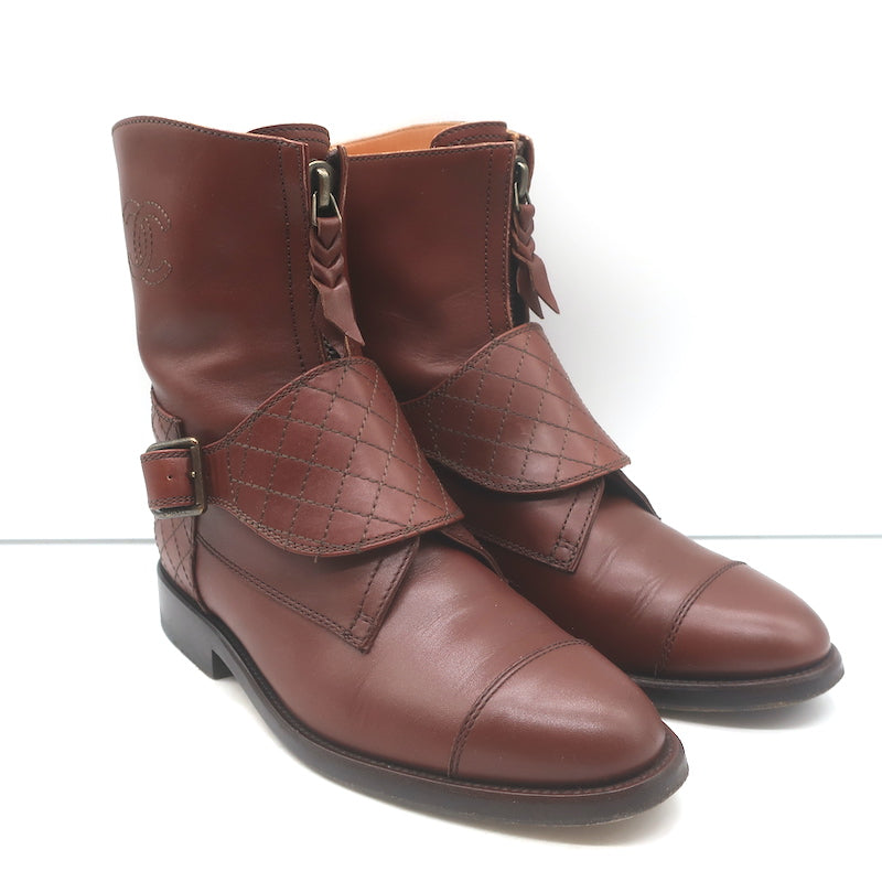 Chanel cap-toe quilted ankle boots in brown leather with CC embroidery, authentic pre-owned gently worn