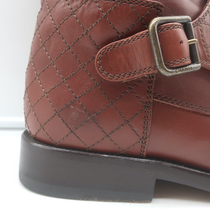 Chanel cap-toe quilted ankle boots in brown leather with CC embroidery, authentic pre-owned, gently worn, size 38