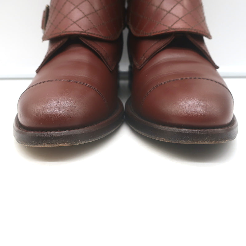 Chanel cap-toe quilted ankle boots in brown leather with CC embroidery, authentic pre-owned, gently worn.