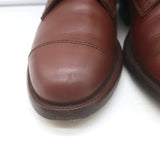 Chanel CC-embroidered cap-toe quilted ankle boots in brown leather, authentic pre-owned, gently worn