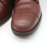 Authentic Chanel cap-toe quilted ankle boots in brown leather with CC embroidery, pre-owned, gently worn