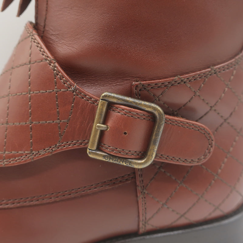 Chanel quilted cap-toe ankle boots, brown leather with CC embroidery — authentic pre-owned, gently worn, size 38