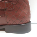 Authentic Chanel cap-toe quilted ankle boots in brown leather with CC embroidery, pre-owned gently worn.