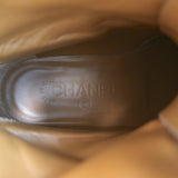 Chanel 12A cap-toe quilted ankle boots in brown leather with CC embroidery, authentic pre-owned