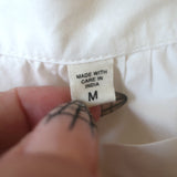 Doen tiered maxi skirt, white cotton poplin, size M — authentic pre-owned, elegant designer piece in good condition