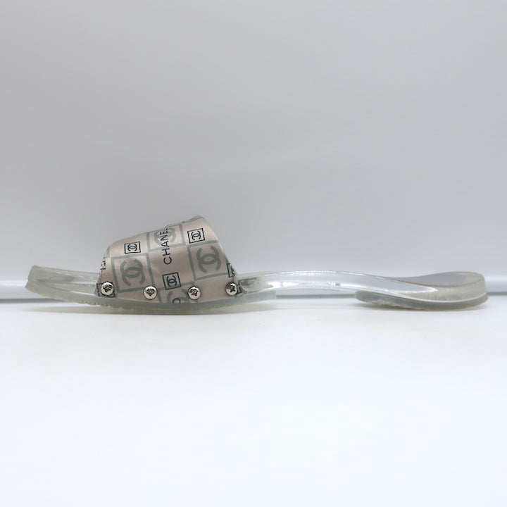 Chanel CC Acrylic Clog Sandals Silver Printed Satin Size 38 Flat Slides