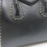 Givenchy Small Antigona chain-trimmed leather crossbody bag in black with gold hardware, pre-owned.