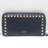 Valentino Rockstud zip-around wallet, dark navy leather with gold hardware, pre-owned with light wear