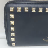 Valentino Rockstud zip-around wallet, dark navy leather with gold hardware — pre-owned, authentic luxury