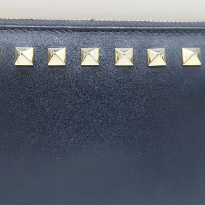 Valentino Rockstud zip-around wallet in dark navy leather with gold hardware, pre-owned