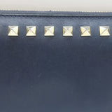 Valentino Rockstud zip-around wallet in dark navy leather with gold hardware, pre-owned