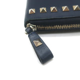 Authentic Valentino Rockstud zip-around wallet in dark navy leather with gold hardware, pre-owned