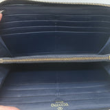 Valentino Rockstud zip-around wallet in dark navy leather with gold studs, pre-owned luxury accessory