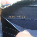 Authentic Valentino Rockstud zip-around wallet in dark navy leather with gold hardware, pre-owned