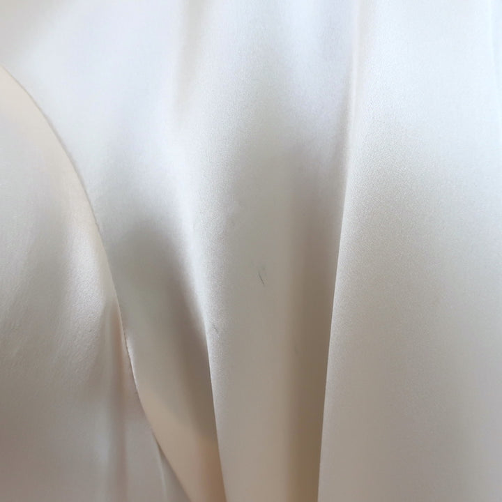 3.1 Phillip Lim twist-neck blouse in ivory silk satin, size 6 — pre-owned designer blouse with luxe finish