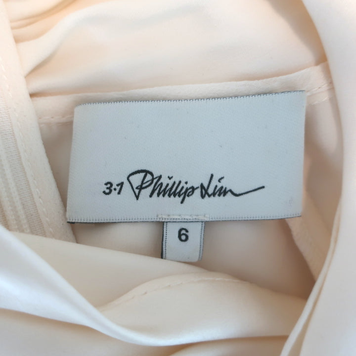 3.1 Phillip Lim twist-neck blouse in ivory silk satin, size 6 — pre-owned luxury piece with minor wear