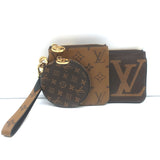 Louis Vuitton Reverse Monogram Giant Trio Pouch Brown Canvas Wristlet Clutch NEW