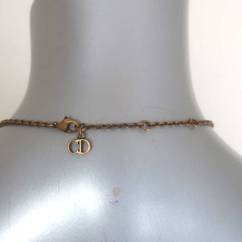 Christian Dior Tresor De Tribale Faux Pearl Pendant Necklace Brass