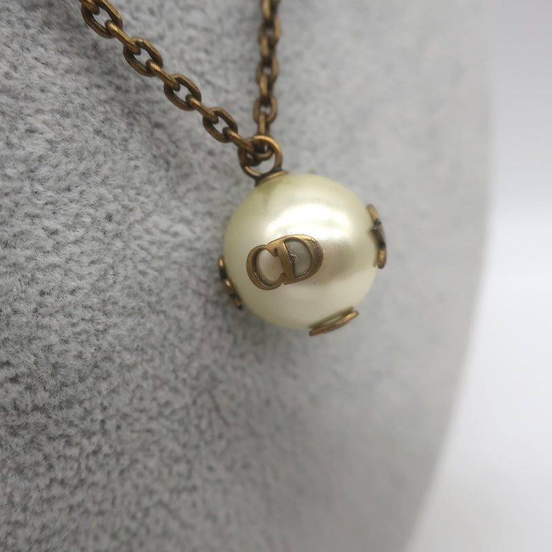 Christian Dior Tresor De Tribale Faux Pearl Pendant Necklace Brass