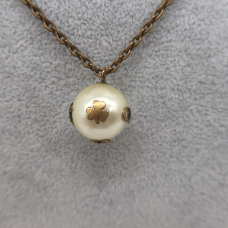 Christian Dior Tresor De Tribale Faux Pearl Pendant Necklace Brass