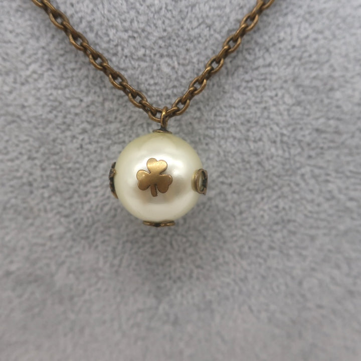 Christian Dior Tresor De Tribale Faux Pearl Pendant Necklace Brass