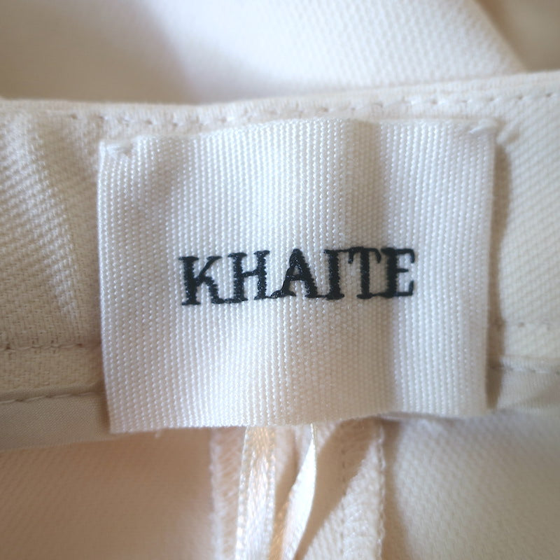 KHAITE Pintucked Cropped High Rise Trousers Ecru Size 8