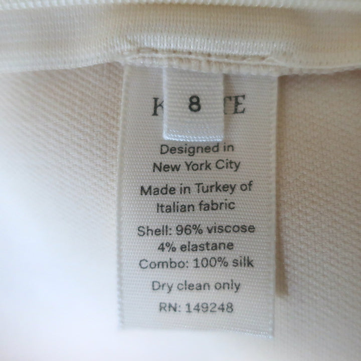 KHAITE Pintucked Cropped High Rise Trousers Ecru Size 8