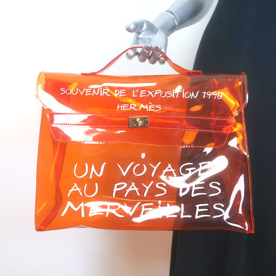 Hermes Souvenir De L'Exposition Vinyl Kelly Bag Transparent Orange