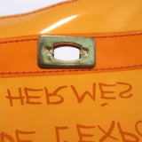 Hermes Souvenir De L'Exposition Vinyl Kelly Bag Transparent Orange