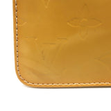 Louis Vuitton Lexington Monogram Vernis Pochette Bag Goldenrod Patent Leather