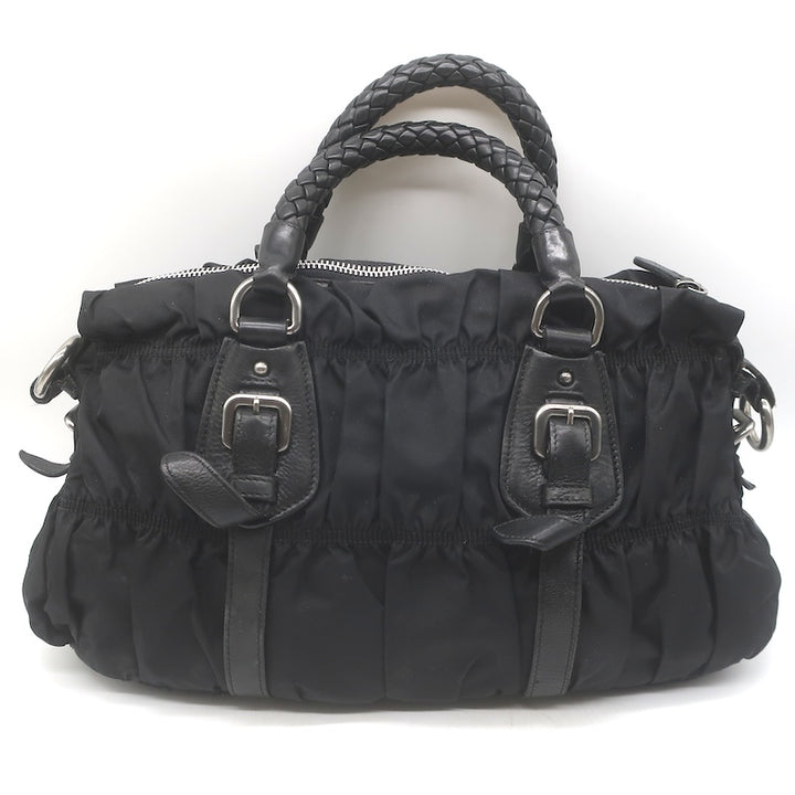 Prada Tessuto Gaufre Braided Handle crossbody bag, zipper close-up