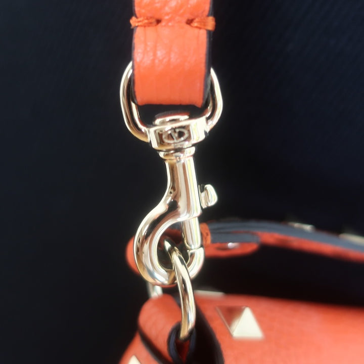 Valentino Rockstud Pouch Orange Grainy Calfskin Leather Mini Crossbody Bag NEW