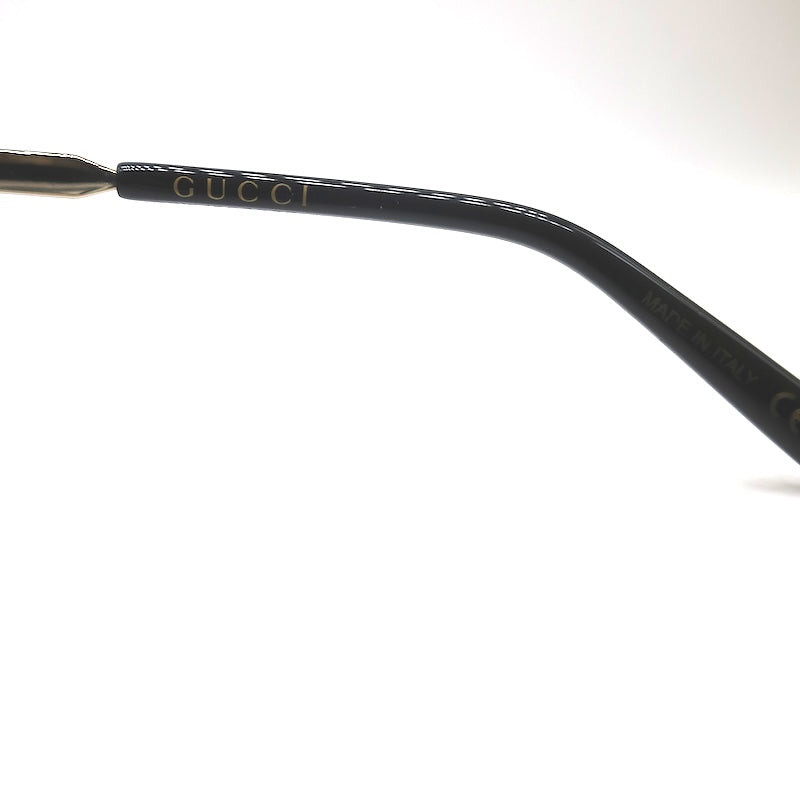 Gucci black temple, MADE IN ITALY and CE mark