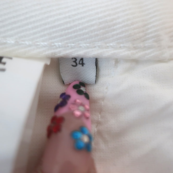 Loewe size 34 tag on white denim