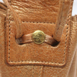 Il Bisonte Drawstring Mini Dumpling Bag Copper Metallic Leather