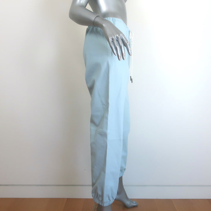 SPRWMN leather drawstring joggers in light blue, pre-owned—authentic, gently worn luxury with subtle waistband scuffs
